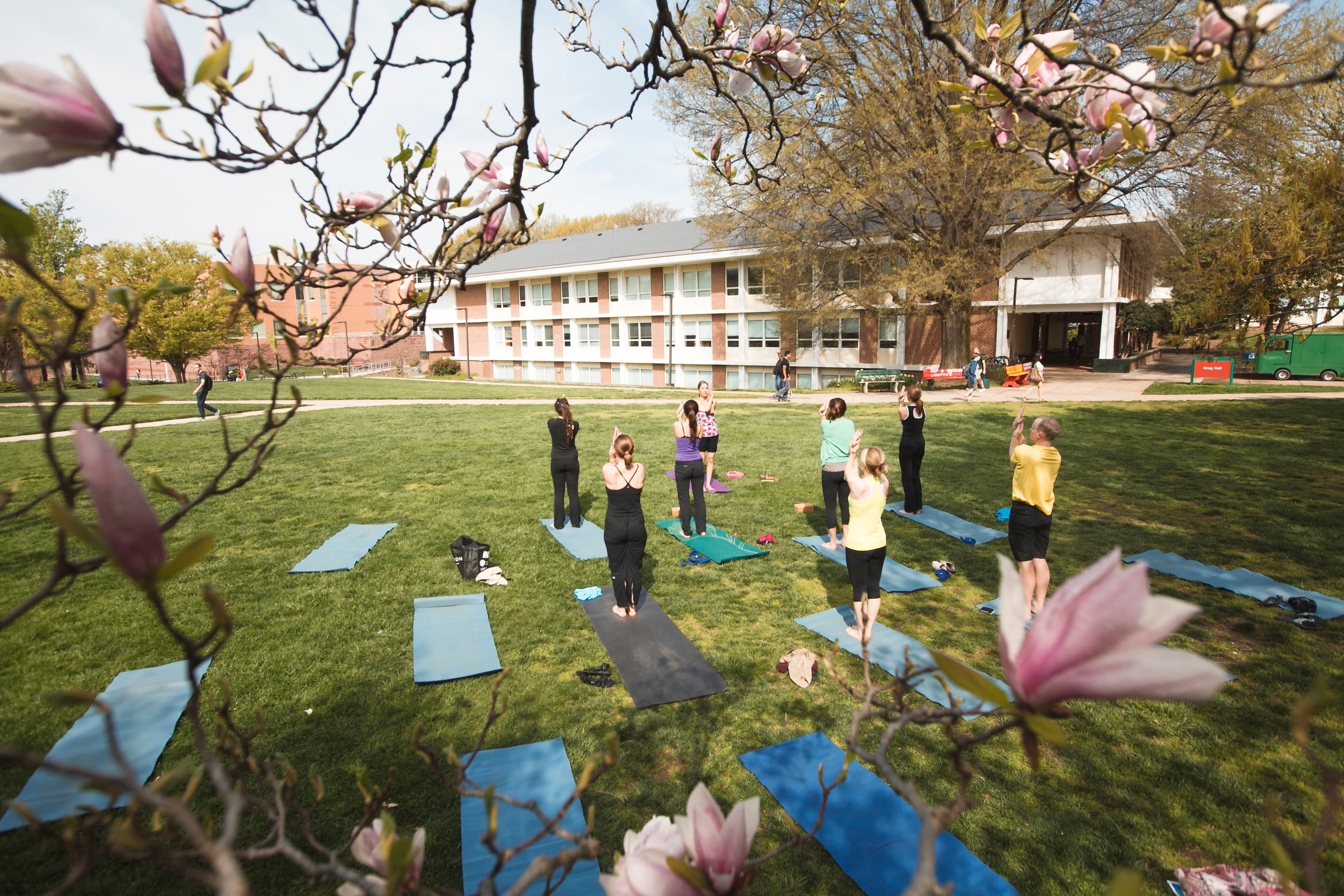 Students participate in outdoor Yoga. Photo by Will Martinez/Creative Services/George Mason University.