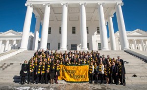 Mason staff, students, faculty, and alumni are seen with Virginia Governor Terry McAuliffe and members of the Virginia General Assembly on the steps of the Virginia State Capitol in Richmond during Mason Lobbies Day. Photo by Alexis Glenn/Creative Services/George Mason University
