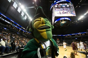 The Patriot mascot gets the crowd hyped as the George Mason Patriots play against Fordham Rams in the Opening Round of the 2014 Atlantic 10 Men's Basketball Championship at the Barclays Center in Brooklyn, NY. Photo by Craig Bisacre/Creative Services/George Mason University