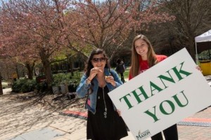 Students and staff participate in Well-Being Day by holding up signs of thanks. Photo by Evan Cantwell/Creative Services/George Mason University